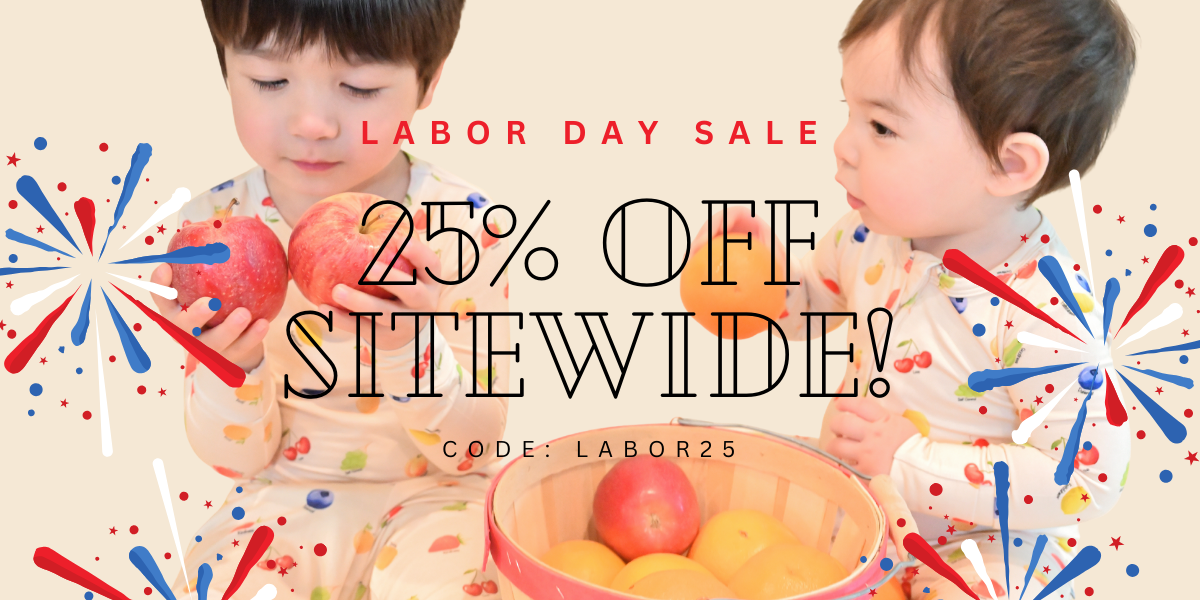 Two children with apples and a bowl of apples, Labor Day sale text, and colorful fireworks.
