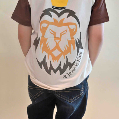 toddler wearing Jesus is King lion tee, back view