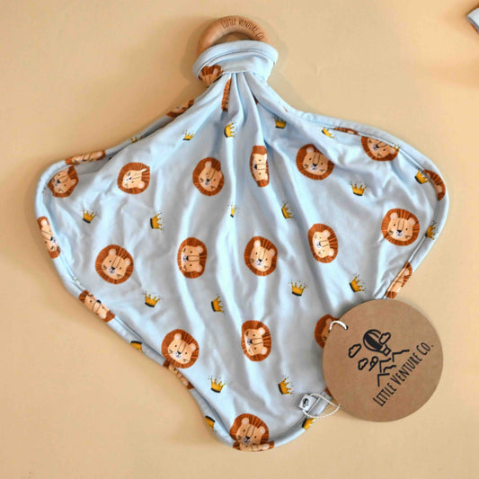 lay flat image of the lion and crown pattern lovey with wooden teething ring